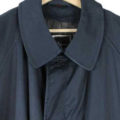 Christian Dior navy blue trench coat, single-breasted, vintage 90s style, classic design.