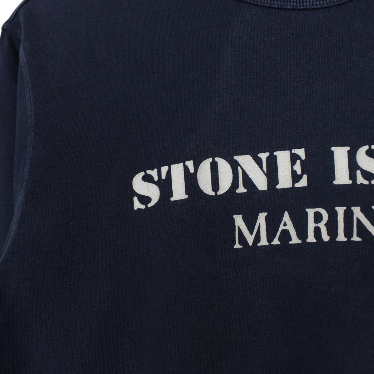 Stone Island navy blue sweatshirt with logo print and thin cotton material.