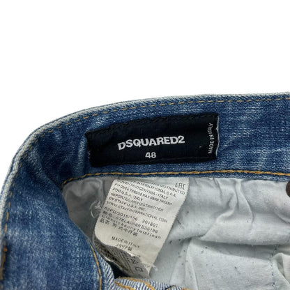 Dsquared2 blue straight jeans with distressed details and logo patch on back pocket.