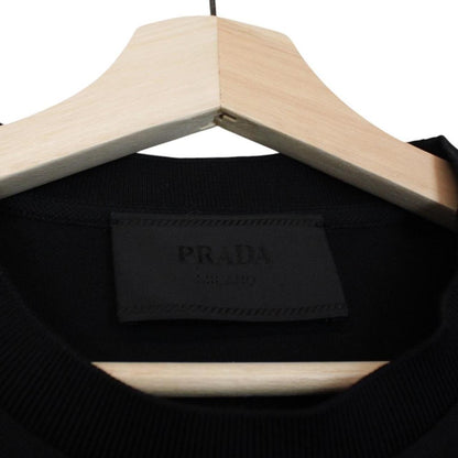 Prada black and white cotton short sleeve t-shirt with logo pocket detail.