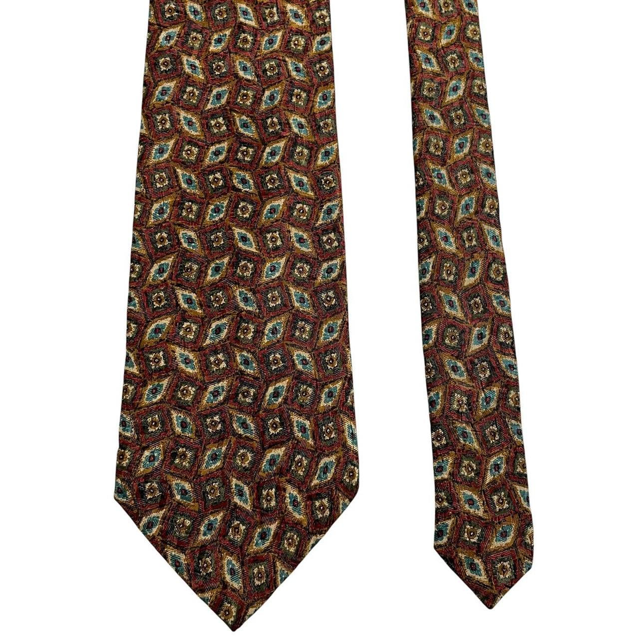 Ermenegildo Zegna multicoloured silk tie with intricate patterns and luxurious sheen.