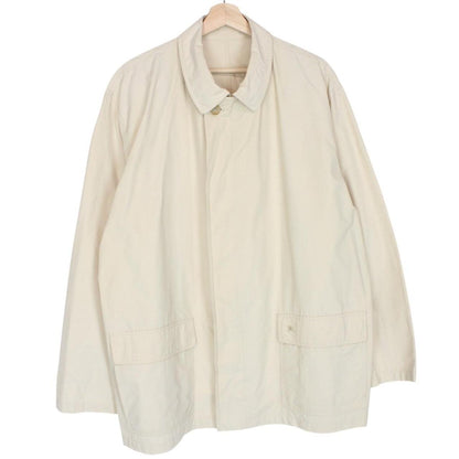Burberry beige coat with classic check pattern and logo detail on collar.