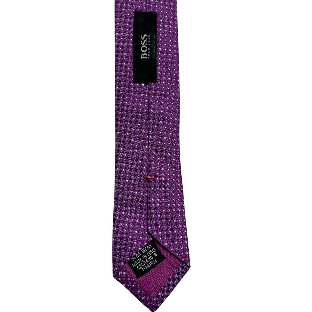 Hugo Boss purple silk tie with smooth texture and subtle sheen.
