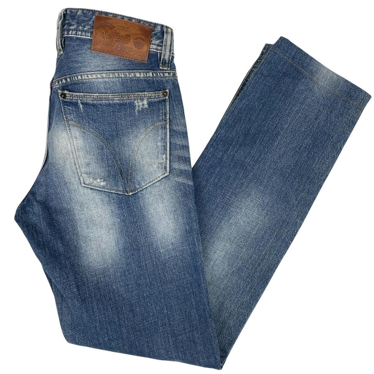 Dolce & Gabbana blue straight jeans mid wash with logo patch and slim fit design.