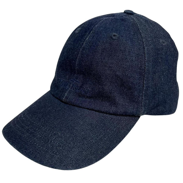 Stone Island blue denim baseball cap with diagonal twill texture and logo patch.
