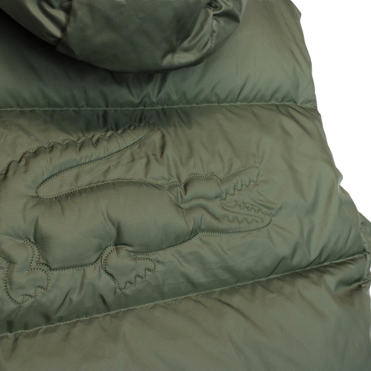 Lacoste khaki green bodywarmer full zip with signature crocodile logo and water-repellent material.