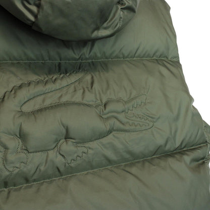 Lacoste khaki green bodywarmer full zip with signature crocodile logo and water-repellent material.