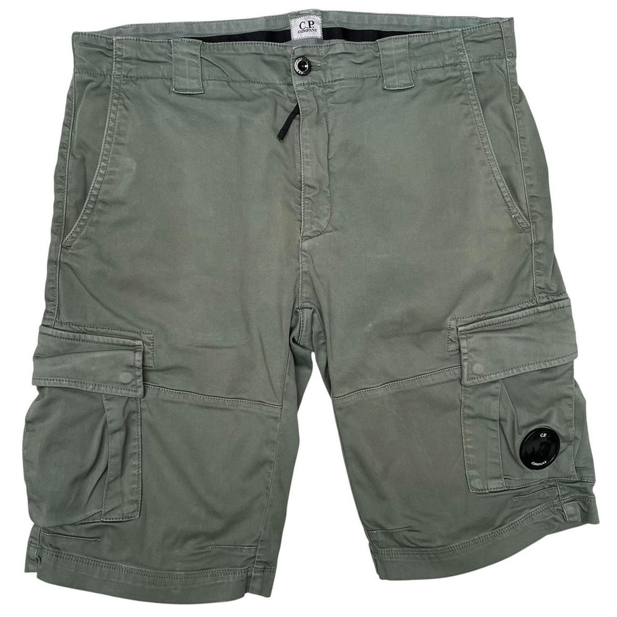 CP Company green cargo shorts with lens detail and cotton material, size XL.