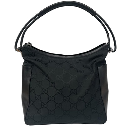 Gucci black hobo shoulder bag with monogram canvas and leather detailing.