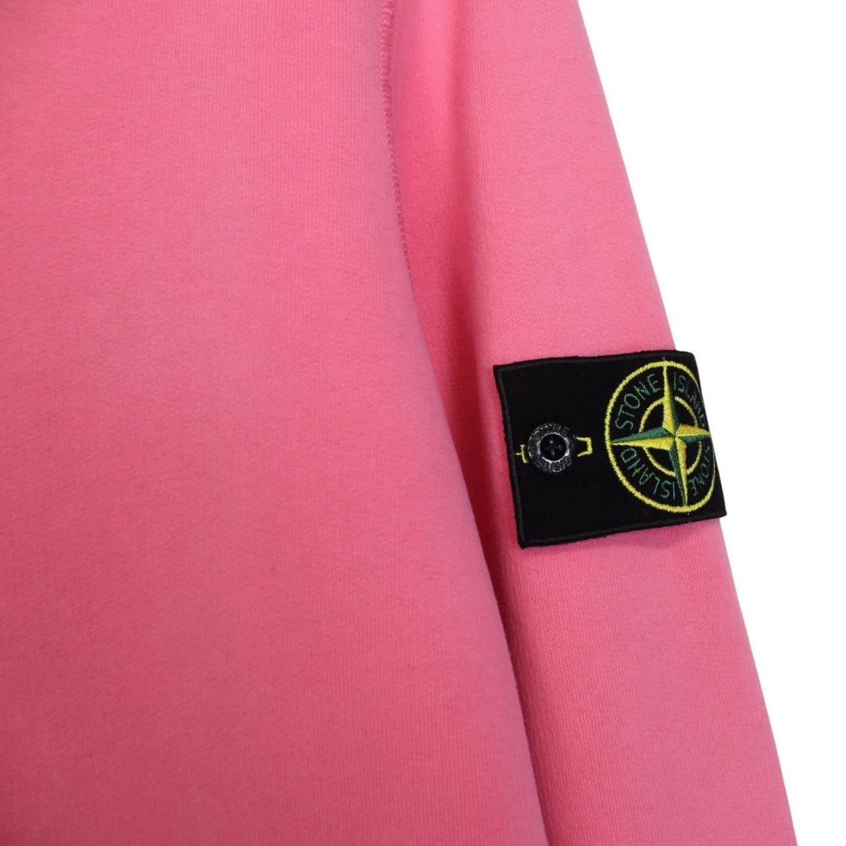 Stone Island pink hoodie jumper with iconic compass logo and soft cotton material.