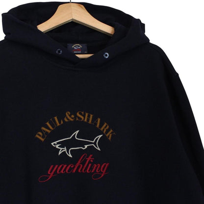 Paul & Shark navy blue hoodie with embroidered logo and cotton material.