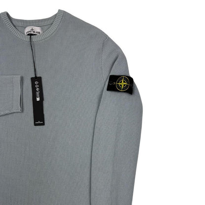 Stone Island grey waffle knit jumper with logo patch and organic cotton material.