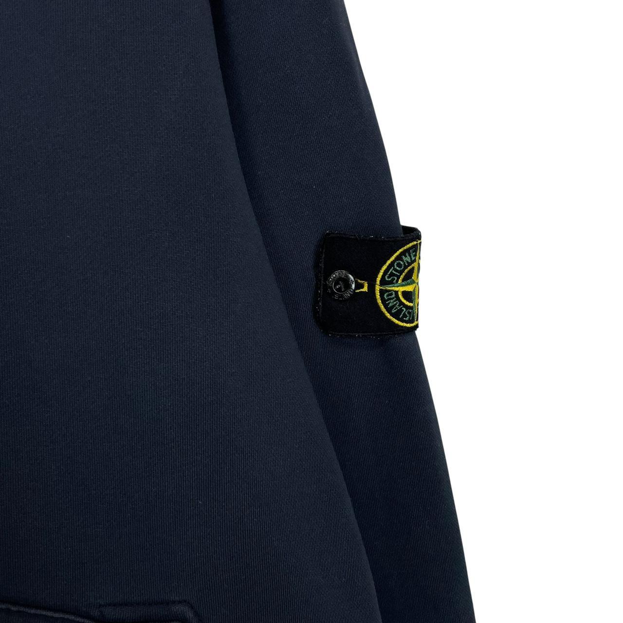 Stone Island navy blue cotton hoodie with iconic compass logo on sleeve.