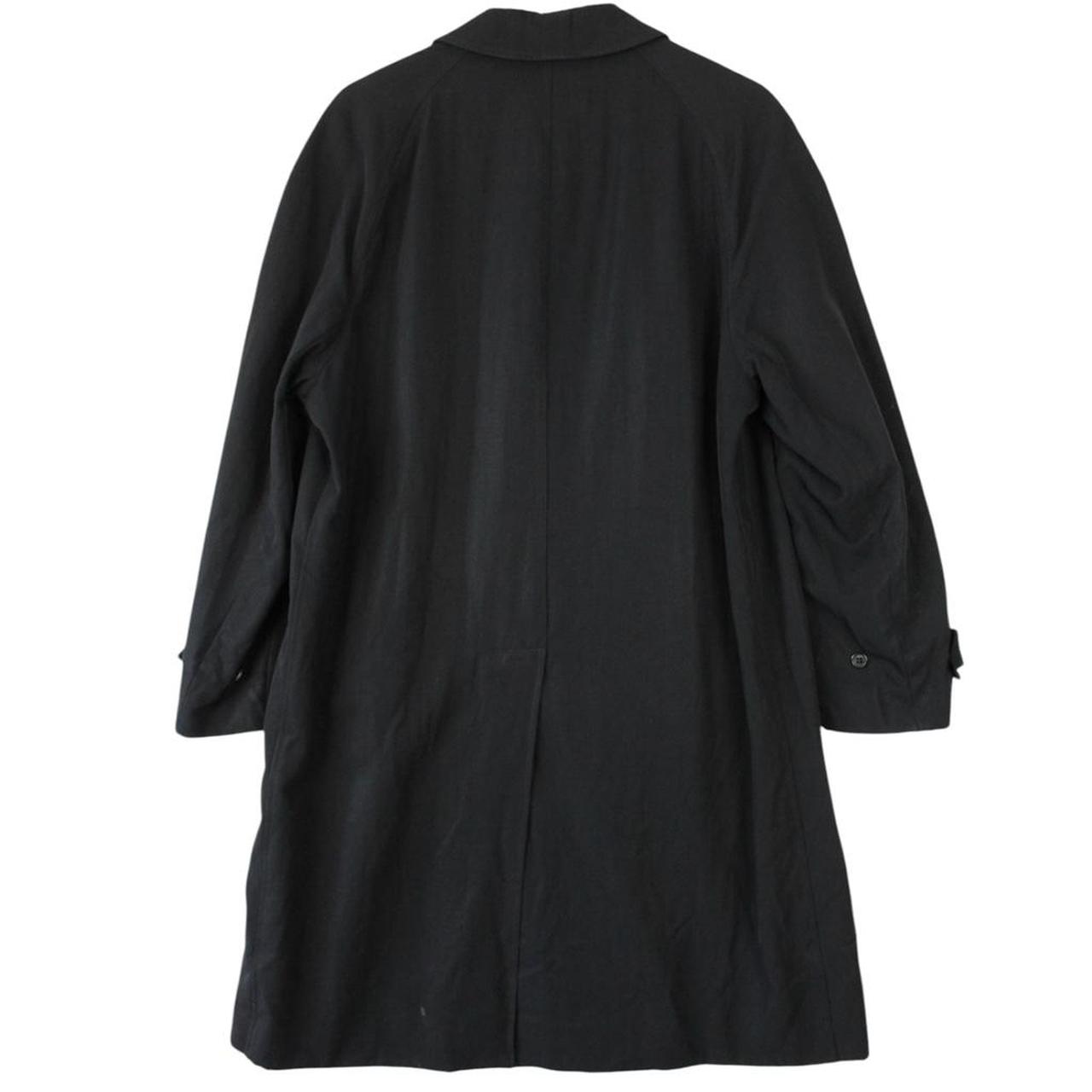 Burberry navy blue wool trench coat with single breasted design and classic logo.