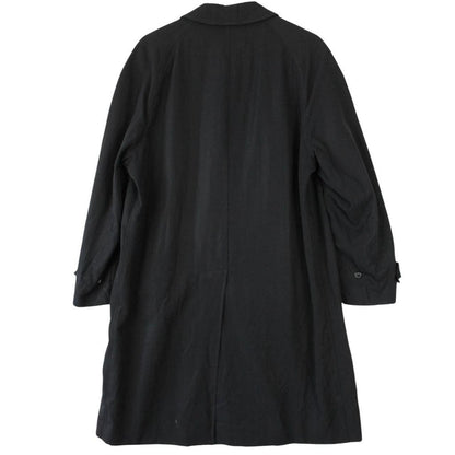 Burberry navy blue wool trench coat with single breasted design and classic logo.