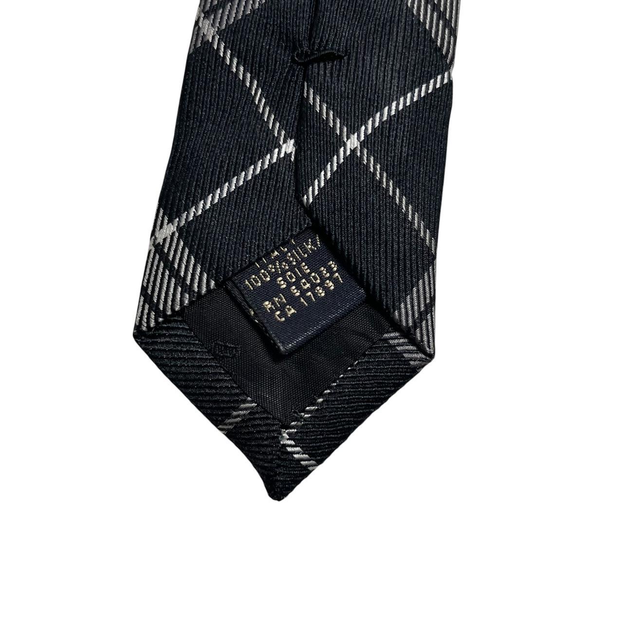 Banana Republic silk tie black and white check pattern with a smooth finish.