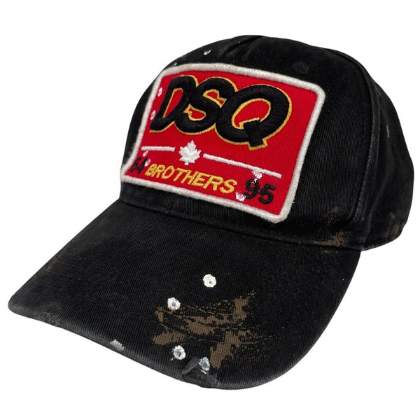 Dsquared2 black and red baseball cap embroidered Brothers logo on front.