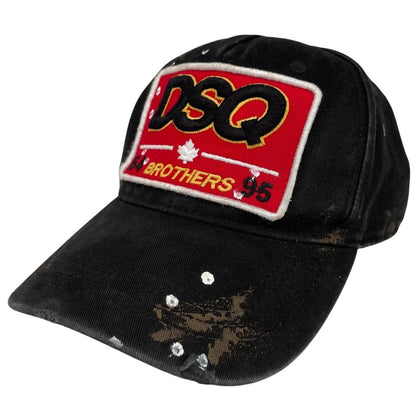 Dsquared2 black and red baseball cap embroidered Brothers logo on front.