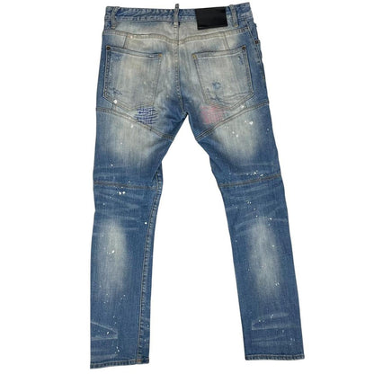 Dsquared2 blue straight jeans with distressed details and logo patch on back pocket.