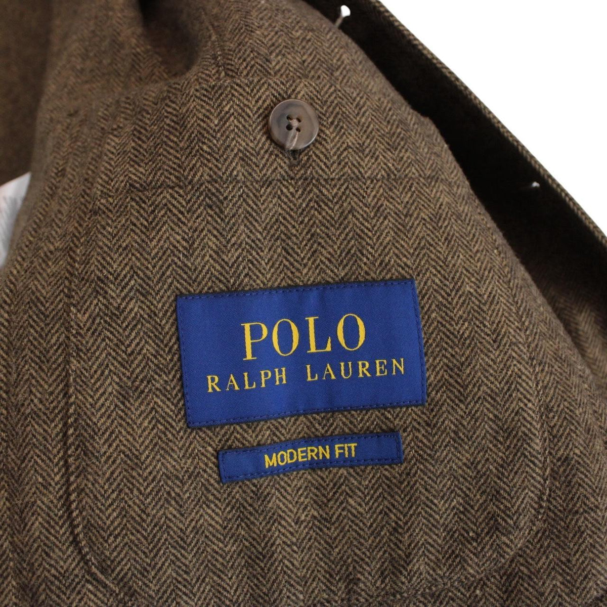 Polo Ralph Lauren brown herringbone wool blend sportcoat blazer with tags and logo.