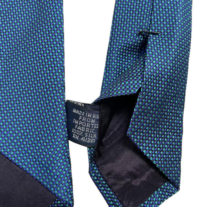 Polo Ralph Lauren blue silk tie with classic logo and smooth texture.