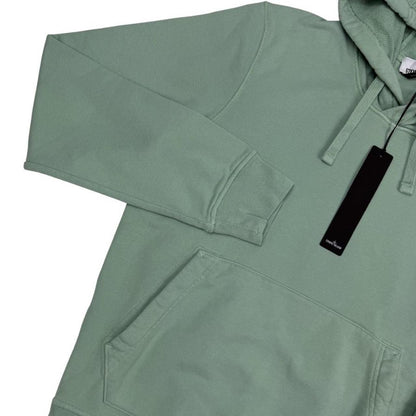 Stone Island green cotton hoodie with logo patch and drawstring hood.