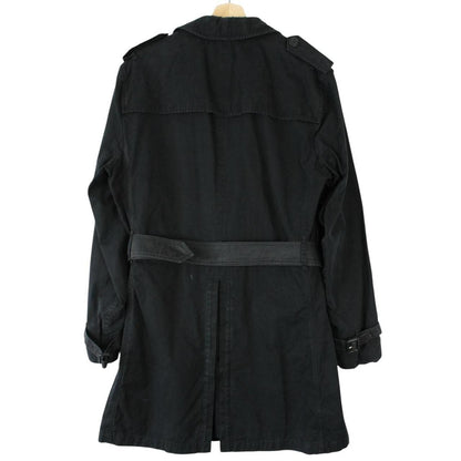 Burberry black trench coat with Nova Check pattern and double-breasted design.