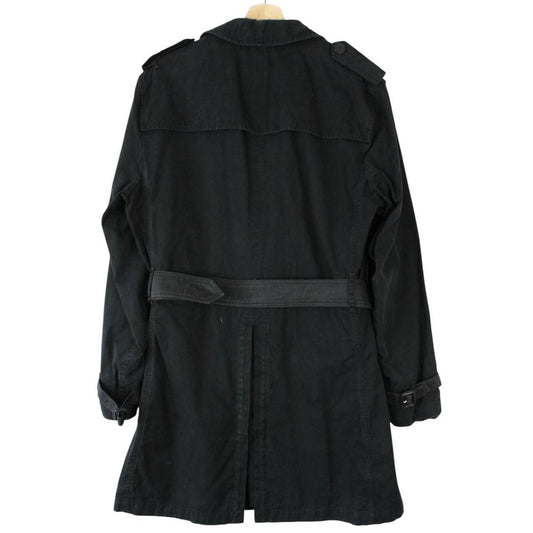 Burberry black trench coat with Nova Check pattern and double-breasted design.