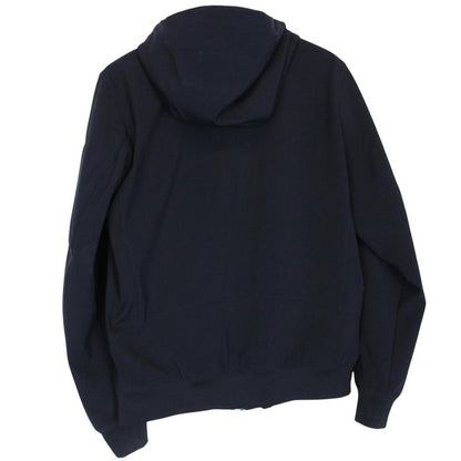 CP Company navy blue goggle jacket with full zip and soft shell material.