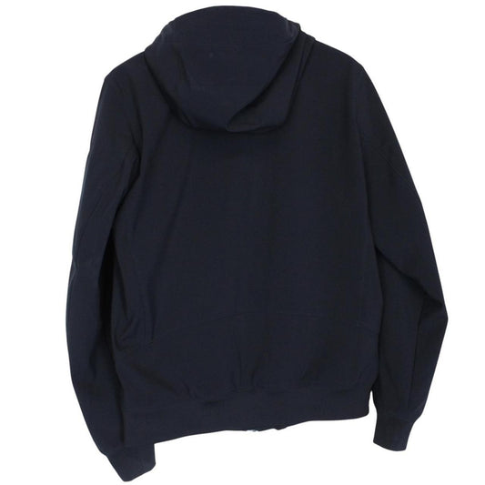CP Company navy blue goggle jacket with full zip and soft shell material.
