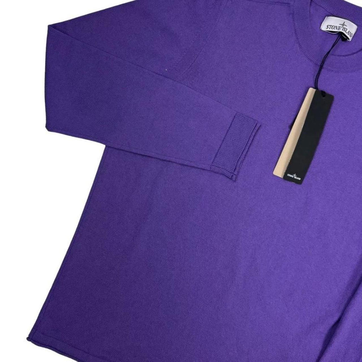 Stone Island purple knit jumper made from organic cotton with logo patch detail.