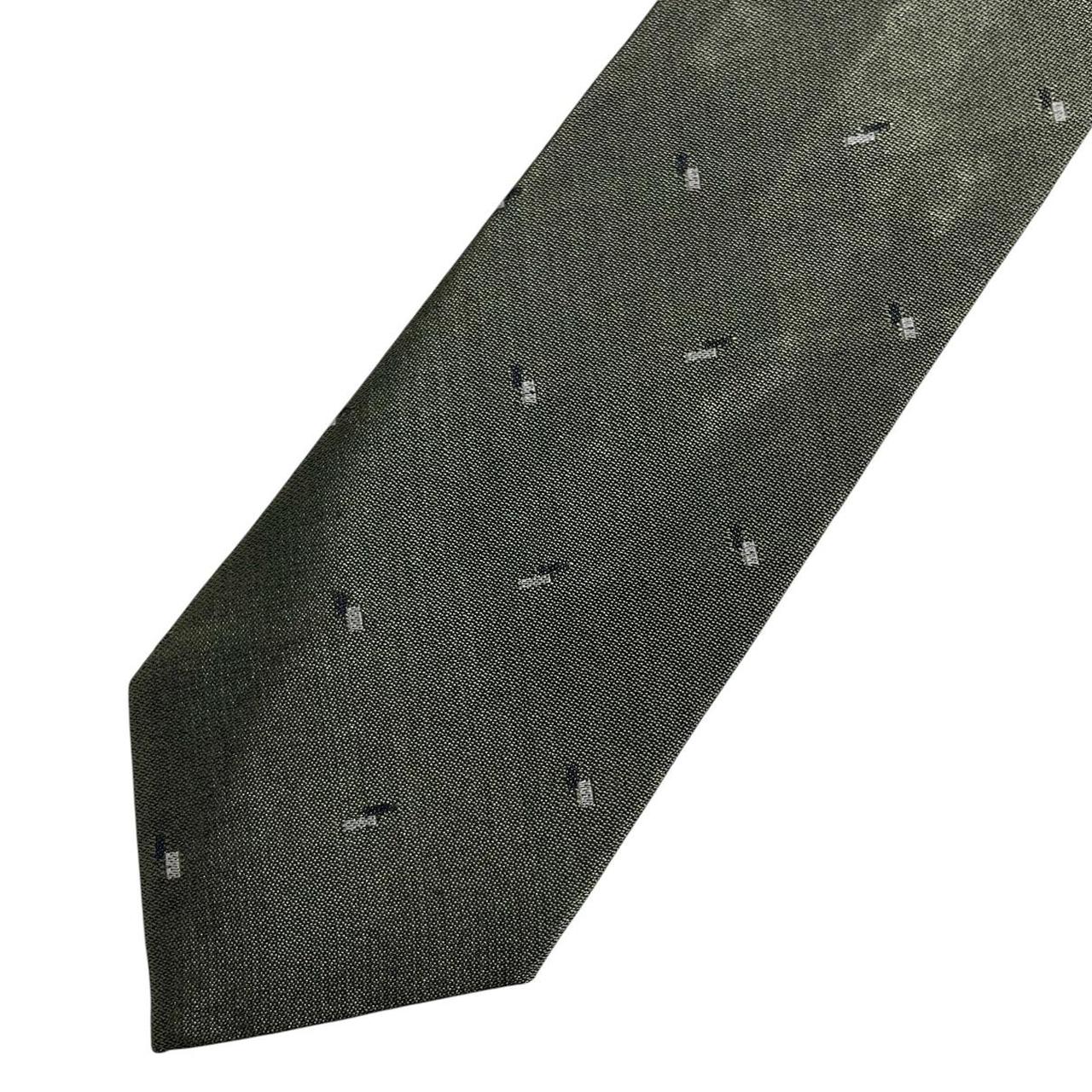 Armani vintage tie wool/polyester blend, dark pattern with subtle logo detail.