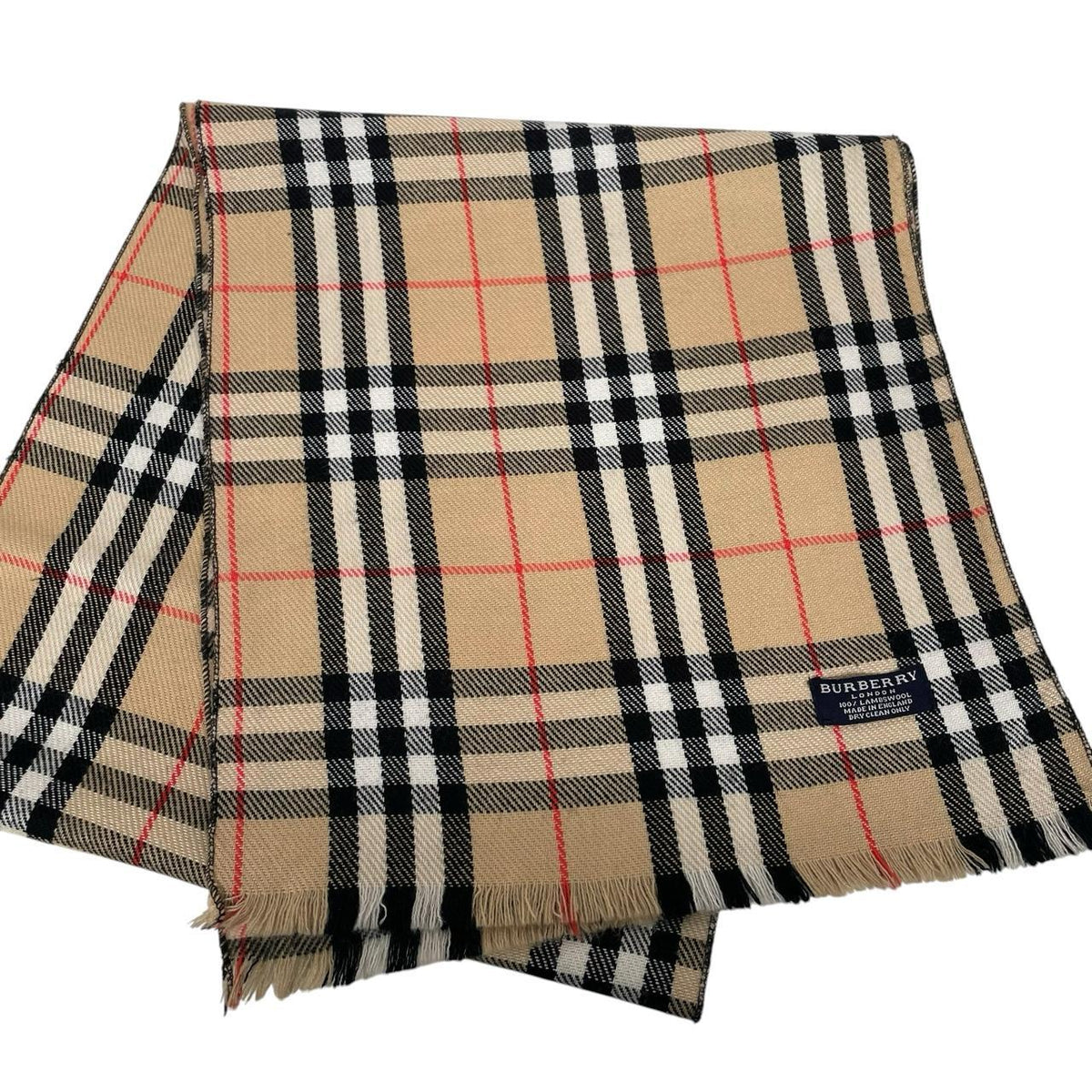 Burberry tan brown lambswool scarf featuring classic Nova Check pattern.