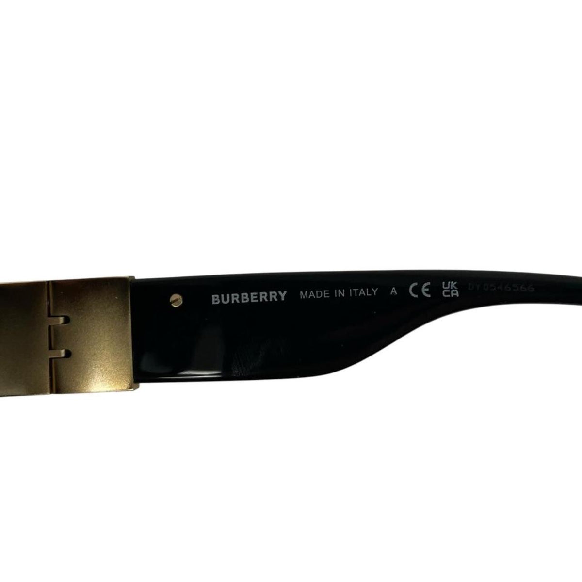 Burberry cat eye sunglasses black and gold with logo detail and case.
