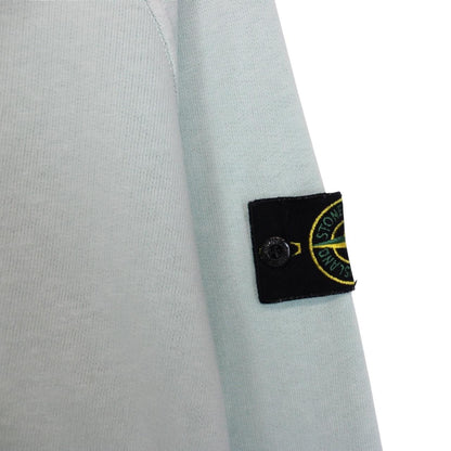 Stone Island mint green cotton sweatshirt with logo patch and ribbed cuffs.